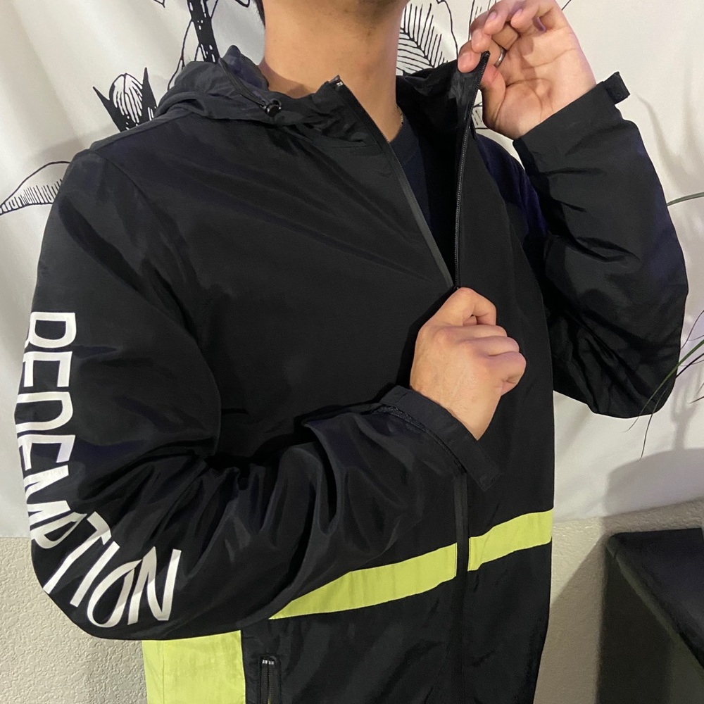 Neon green and black windbreaker